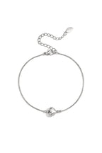 Minimalistische armband met versierd hartje