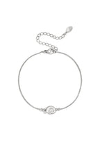 Minimalistische armband met spiraalschelp